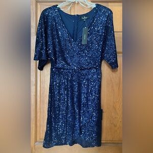 NWT Lulus blue sequin dress.Size S Faux wrap party dress short sleeves, lined